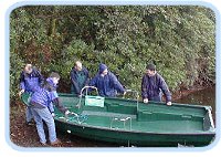 IDEAs Members brining a boat ashore
