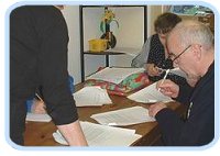 Signing the paperwork at the EGM.