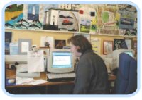 An IDEAs member working ona computer