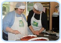 Two IDEAs members cooking.
