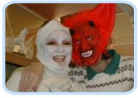 Two IDEAs dressed up at Halloween.