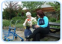Two IDEAs members in the garden.